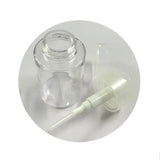 Refillable push-type dispenser bottle for nail polish remover or makeup, with clear plastic body and pump top.